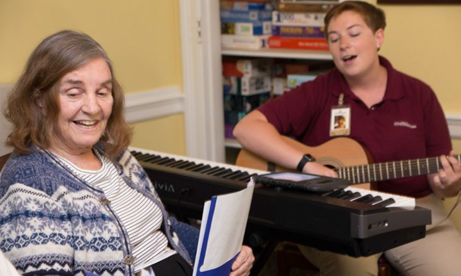 Residents enjoy music therapy to promote healthy aging.